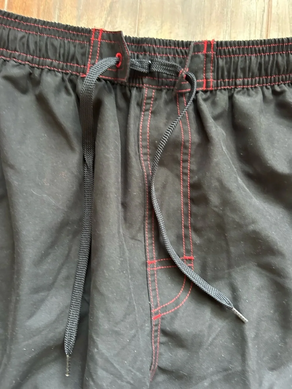TYR Black Swim Shorts with Red Stitching